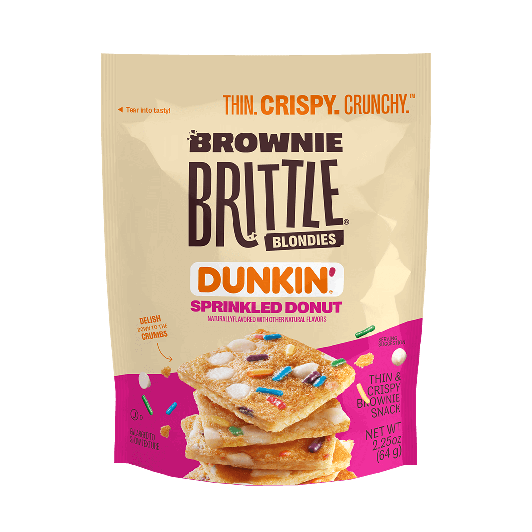 A beige snack bag labeled "Brownie Brittle Blondies" with "Dunkin' Sprinkled Donut" flavor. Contains images of thin, crispy squares with colorful sprinkles. The text highlights its thin, crispy, and crunchy texture.