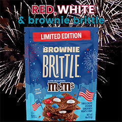 a bag of Red, white and brownie brittle - limited edition brownie brittle & M&M's on a background of fireworks