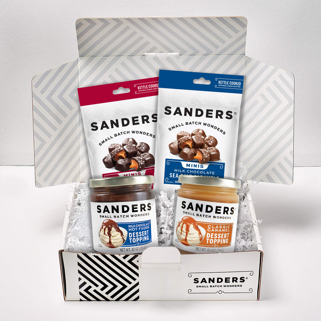  Sanders dessert topping products in a box with a white background