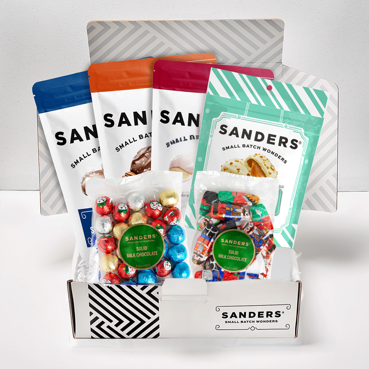 Collection of Sanders chocolate and candy packages on a white background called Sanders Sweet Appreciation Gift Box