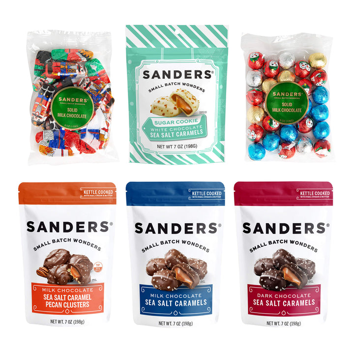 Collection of Sanders chocolate products including candy and caramel clusters on a white background
