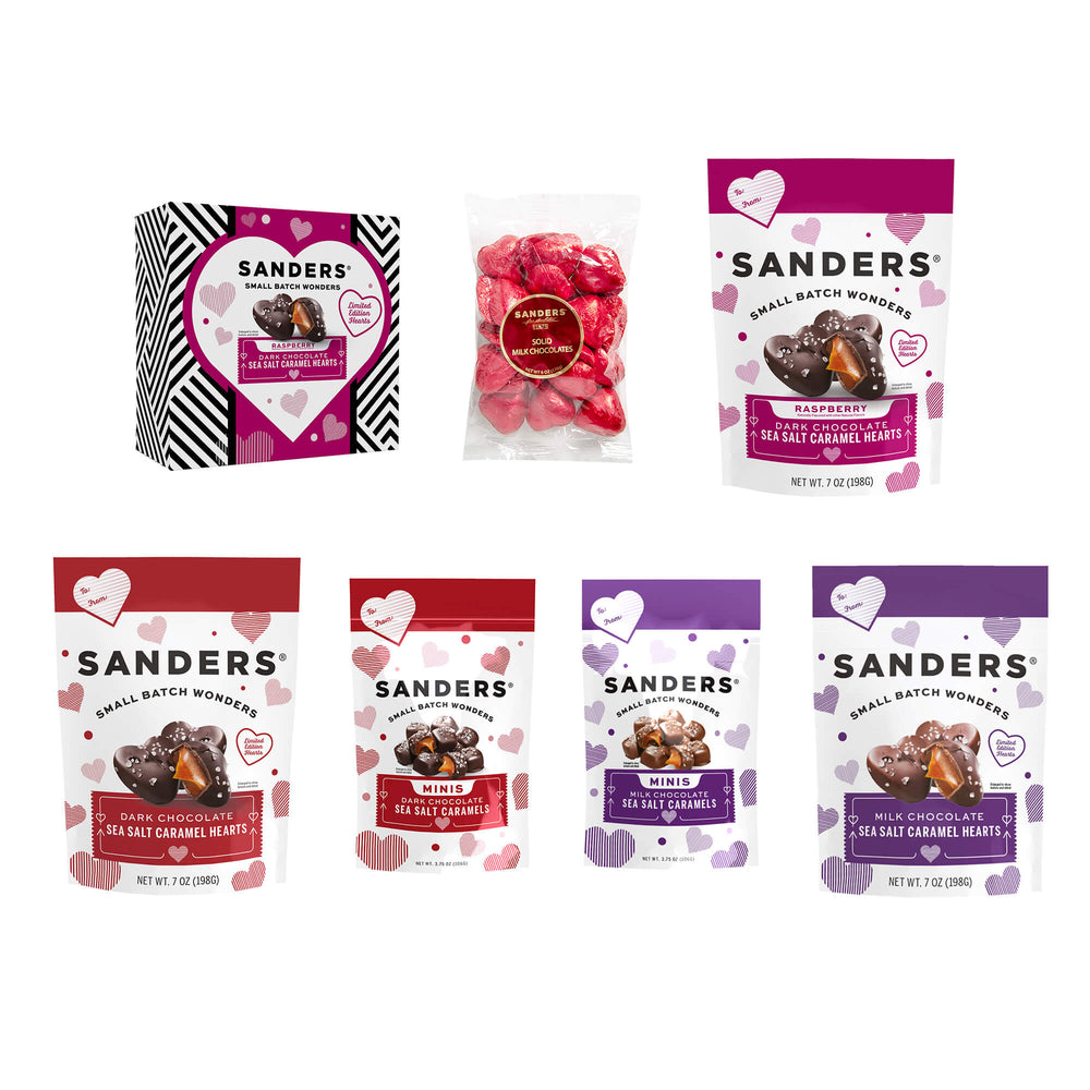 Assorted Sanders chocolates with heart-themed packaging. Includes dark, milk, and raspberry flavors in vibrant red, black, and purple designs.