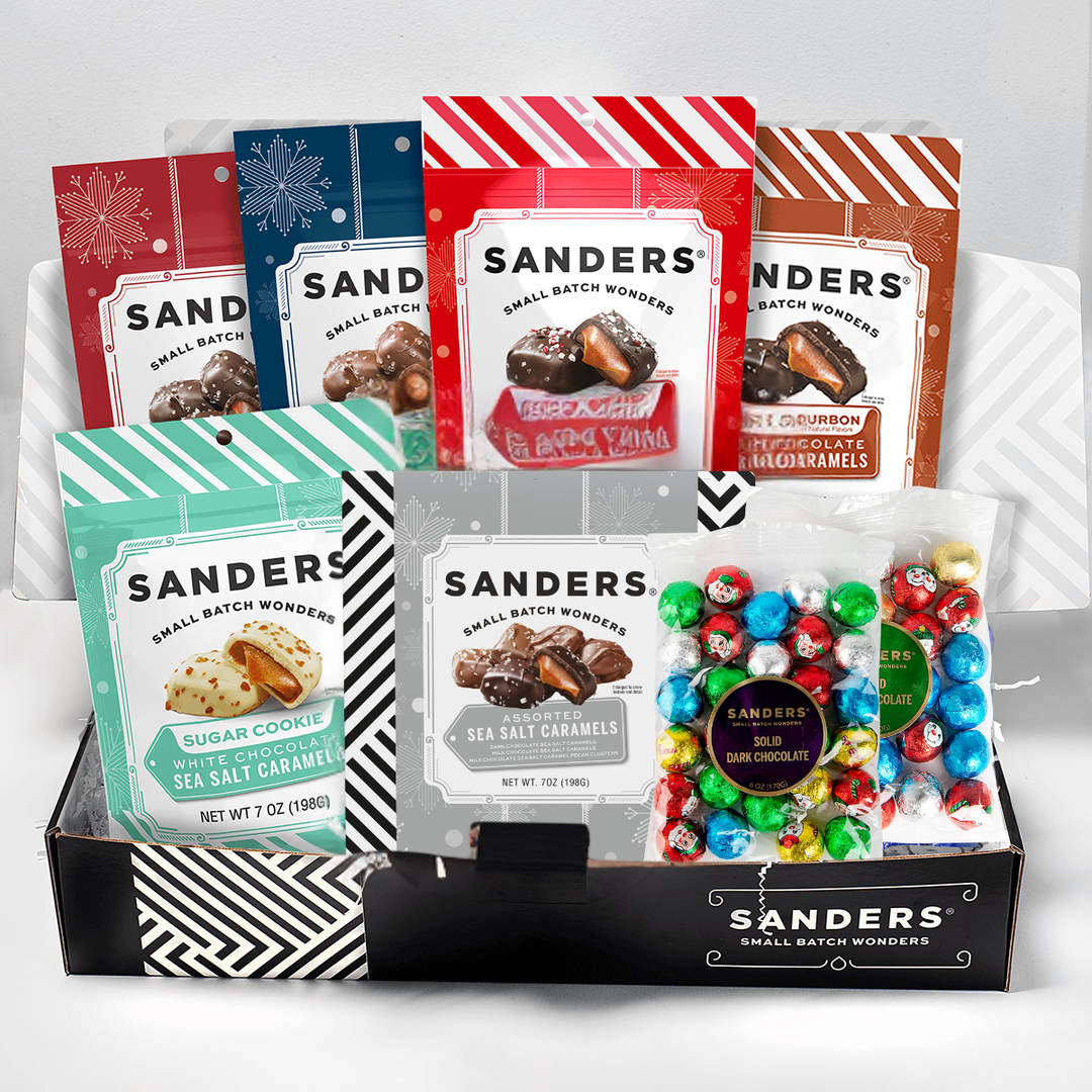 Assorted Sanders chocolate and candy packages on a white background